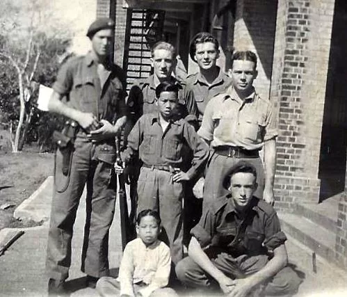 My dad Royal Marines Middle row on the right in Hong Kong